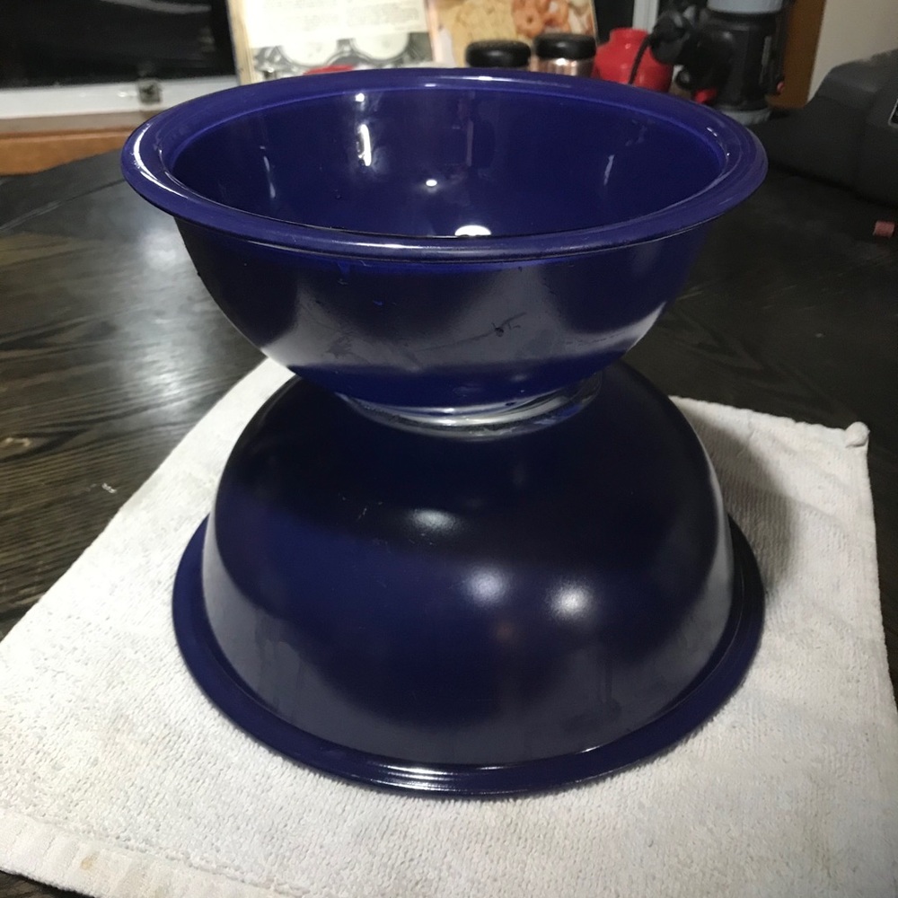 Two cobalt blue vintage Pyrex mixing bowls